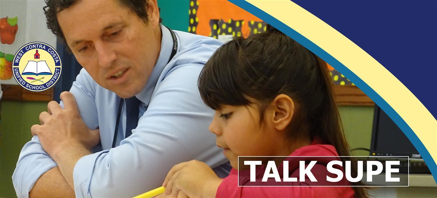 Superintendent Matthew Duffy's Blog Banner featuring him sitting with a Lincoln student 